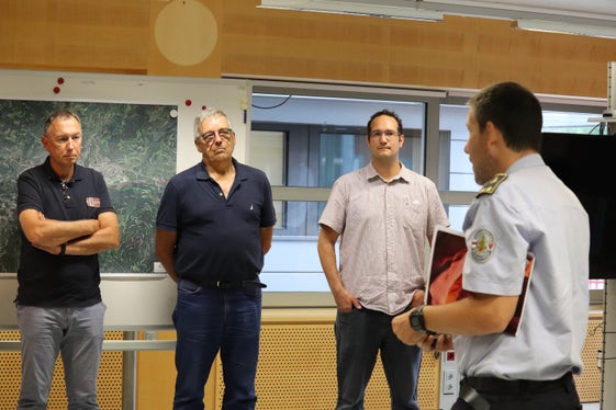 Il vicedirettore del Corpo permanente dei Vigili del fuoco di Bolzano Andrea Lazzarotto (nella foto a destra) insieme a Thomas Meier, Hanspeter Keller e Gerd Heynen (Foto: ASP/Maja Clara)