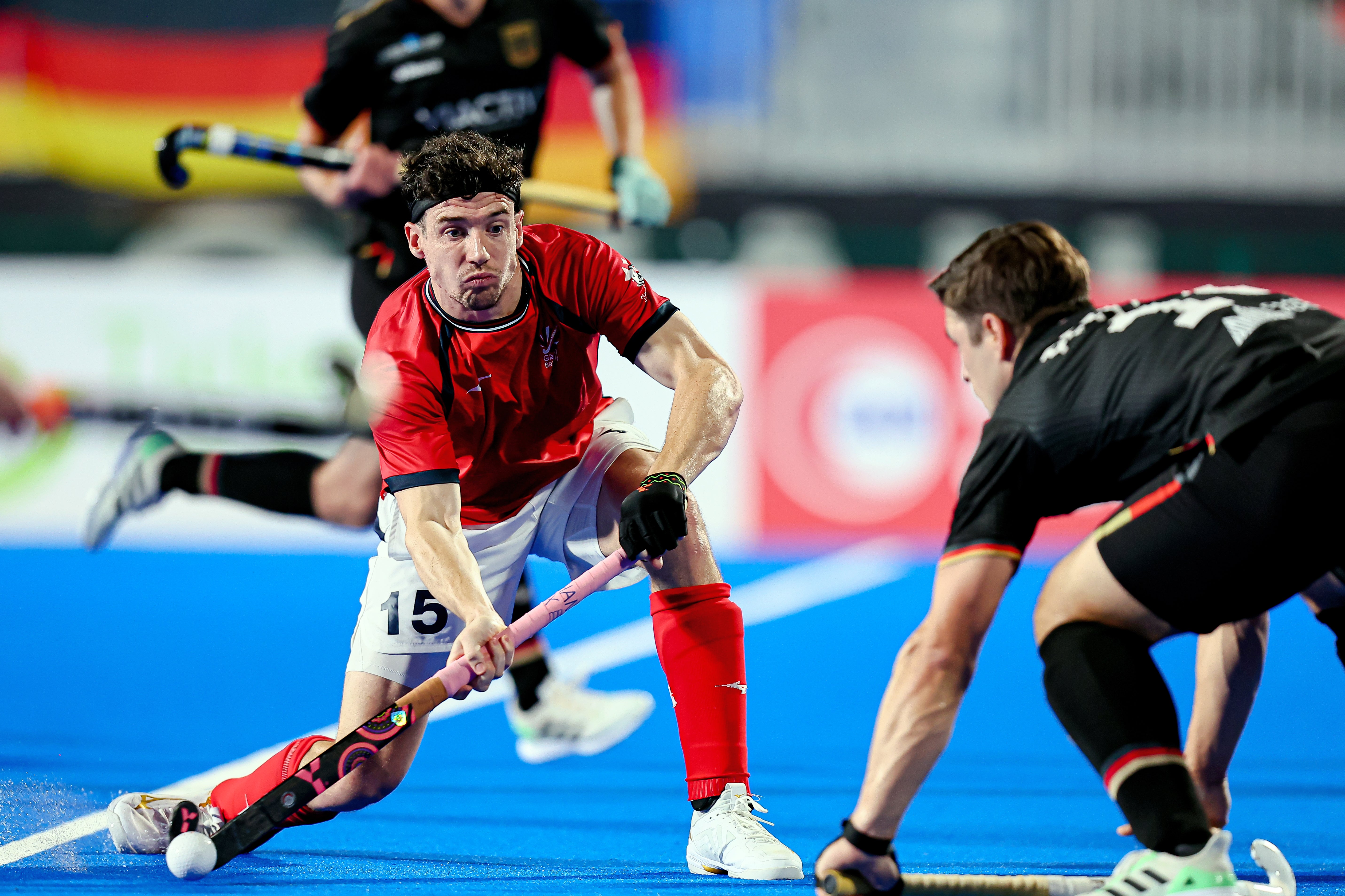 RJR35111 - Great Britain: Phil Roper: A balancing act of hockey and fatherhood - Hunched over, cross-legged with his eyes glued to the television, a dream had been realised.