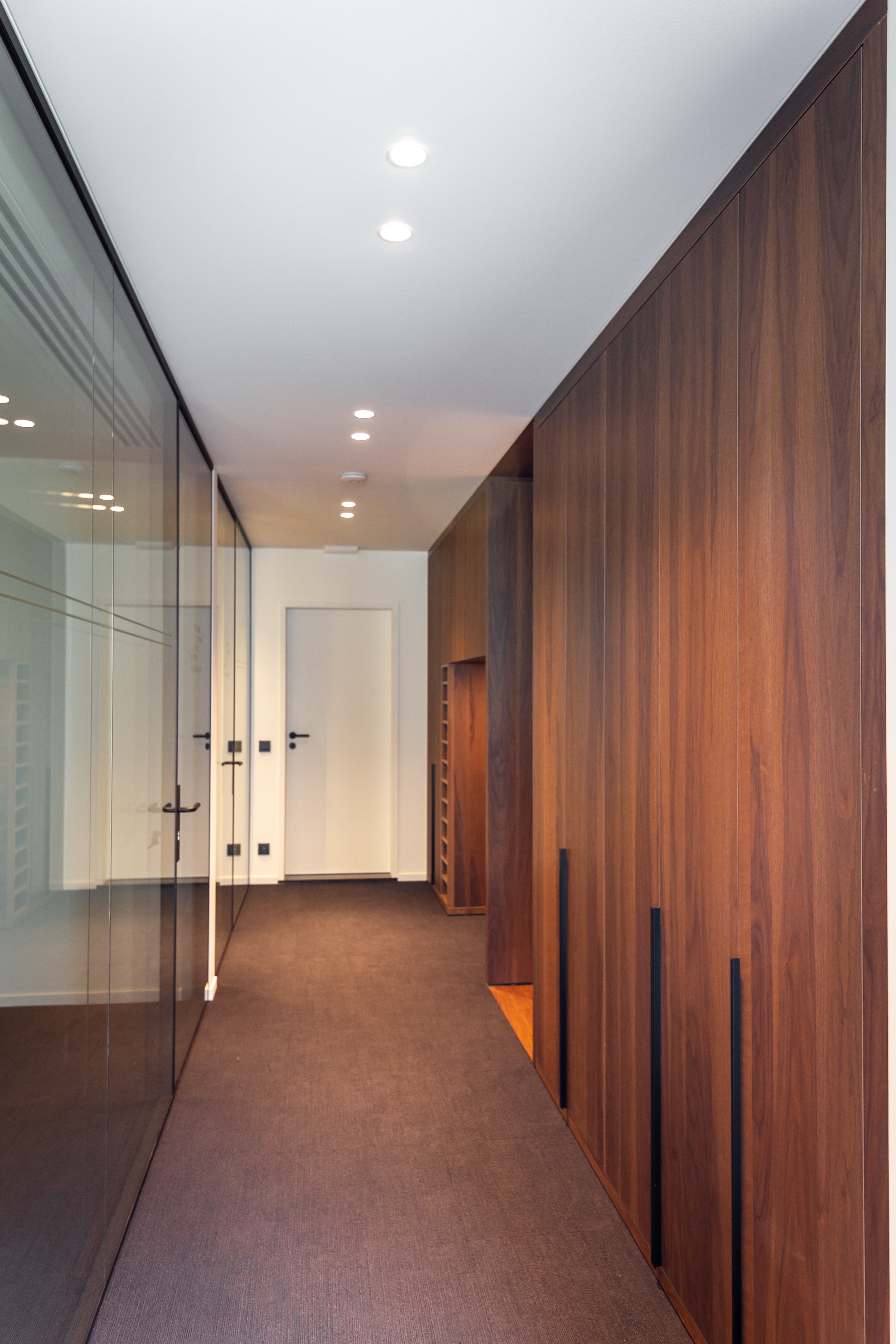 Shinnoki - smoked walnut - office wood wall - wood panels - prefinished wood panels - office - office hall