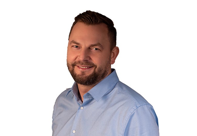 Krzysztof Krzak headshot