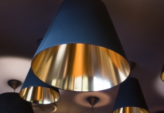 Black pendant lighting with shiny gold interior