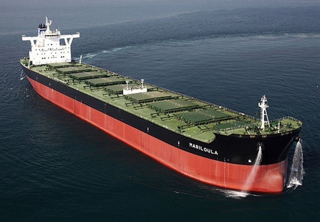 A large cargo ship in the water