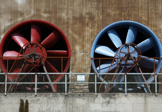 Large industrial fans covered in red and blue coatings