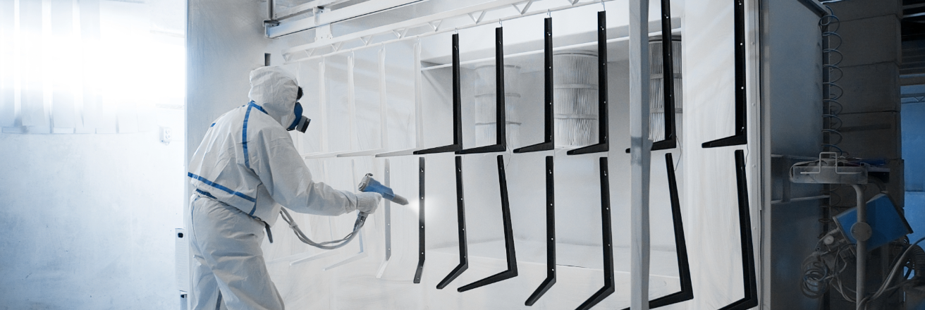 White metal pieces on manufacturing powder coating line