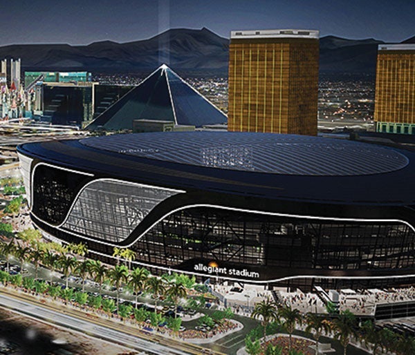 A stadium with a pyramid and palm trees