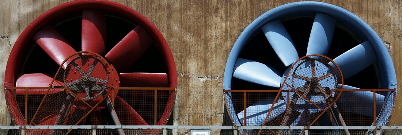 Large industrial fans covered in red and blue coatings