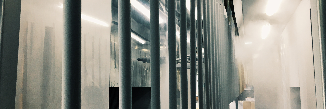 Appliance header image of Envirocron powder being sprayed onto a metal structure