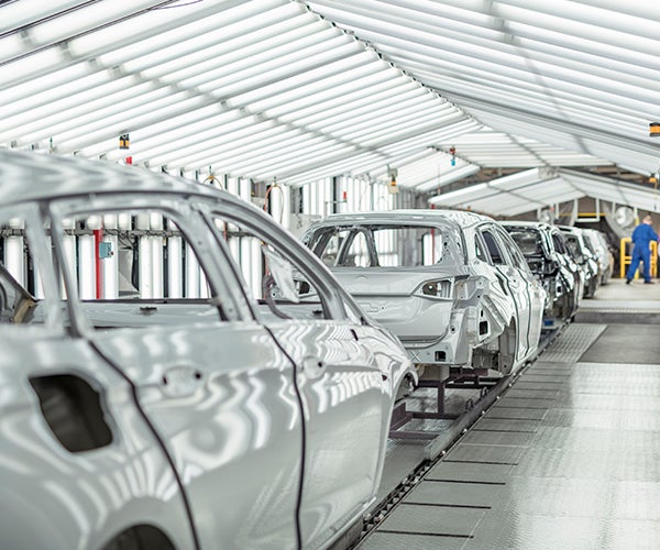 Cars on assembly line