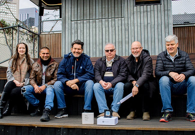 Beppe Casalini, a PPG employee within our Automotive Refinish Coatings business, with his colleagues