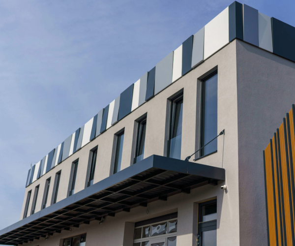 Building storefront with multicolored exterior.