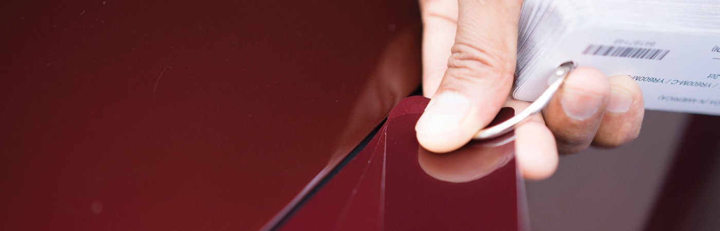 Paint swatches being compared to bodywork