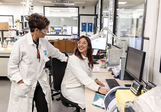 Two female workers in chemistry laboratory