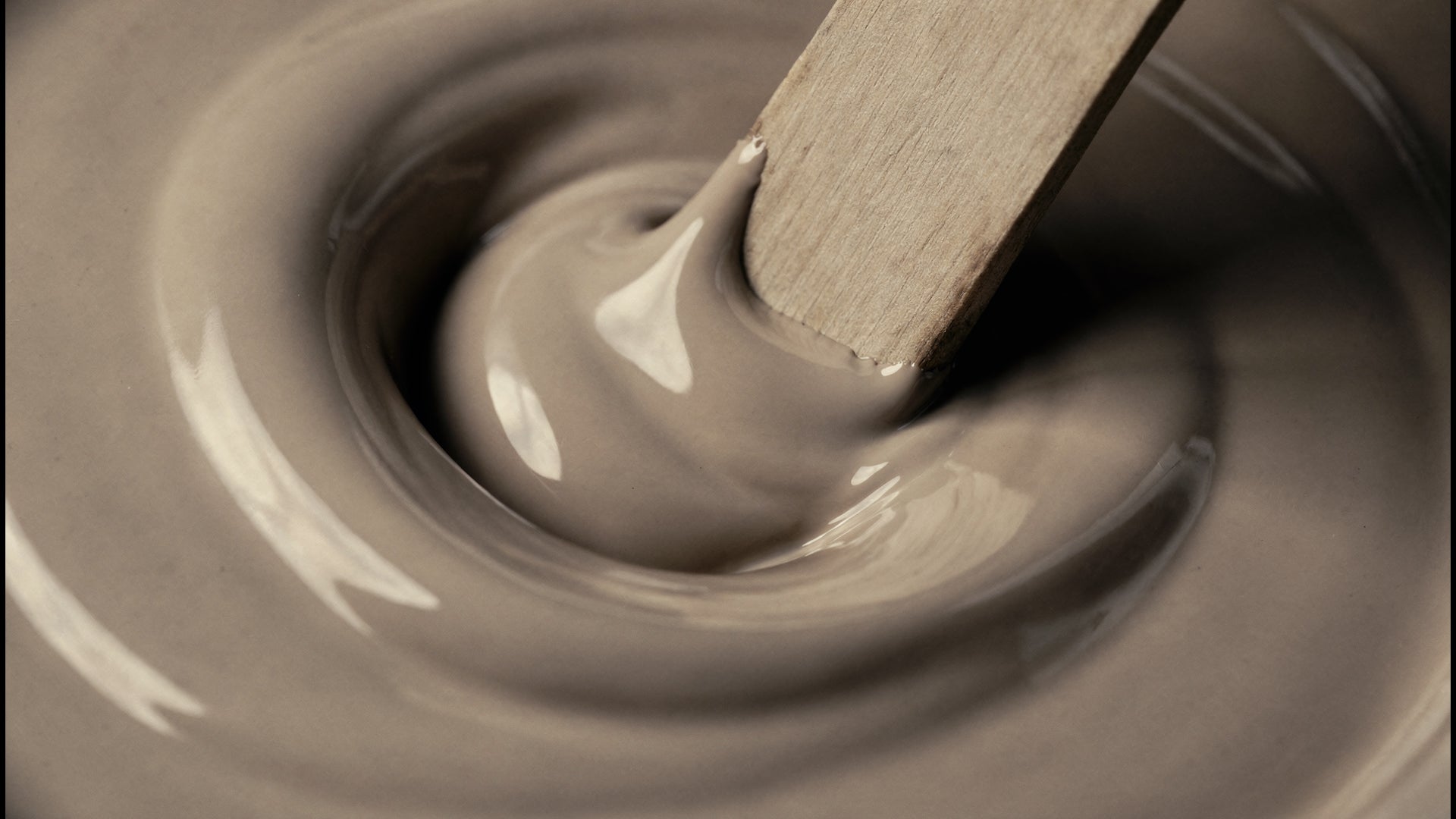 A wooden stick in a liquid