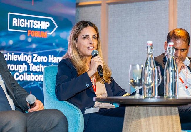 Ariana Psomas, a PPG employee, speaks at the RightShip Forum