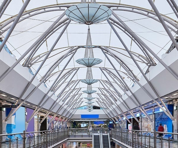 A glass roof with a white ceiling