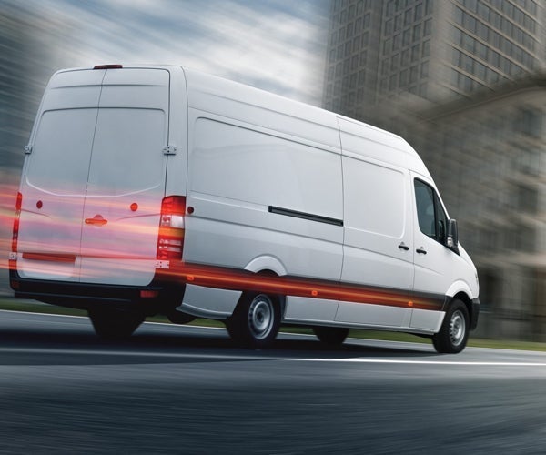 Large van travelling along road