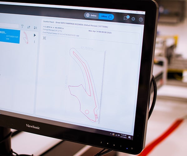 A computer screen with a CAD drawing on it