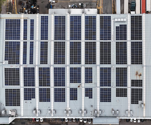 Large industrial unit roof covered with solar panels