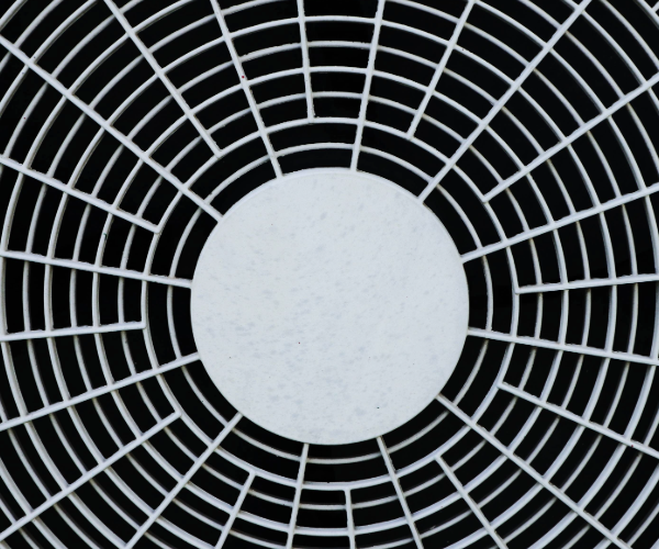 Silver vent covering for an air intake on a compressor