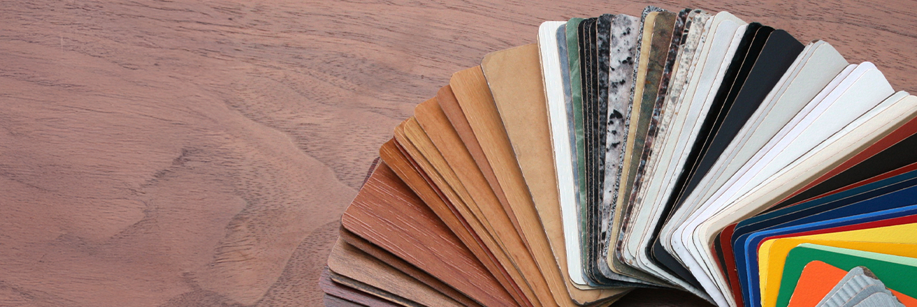 Colorful fan deck display against a wooden surface