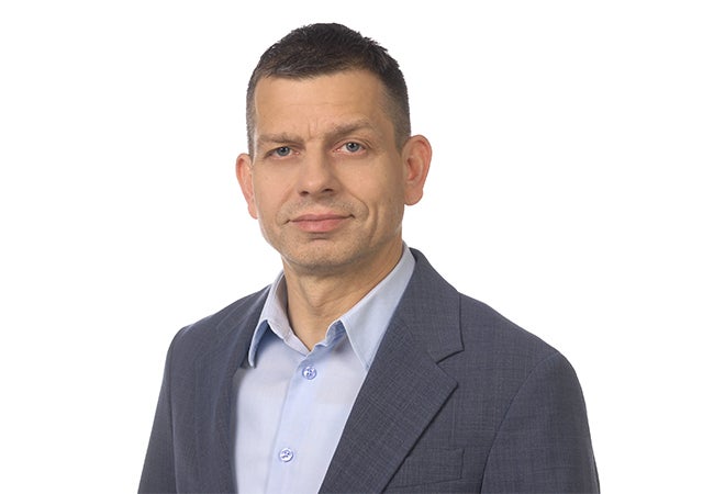 Maciej Królik headshot