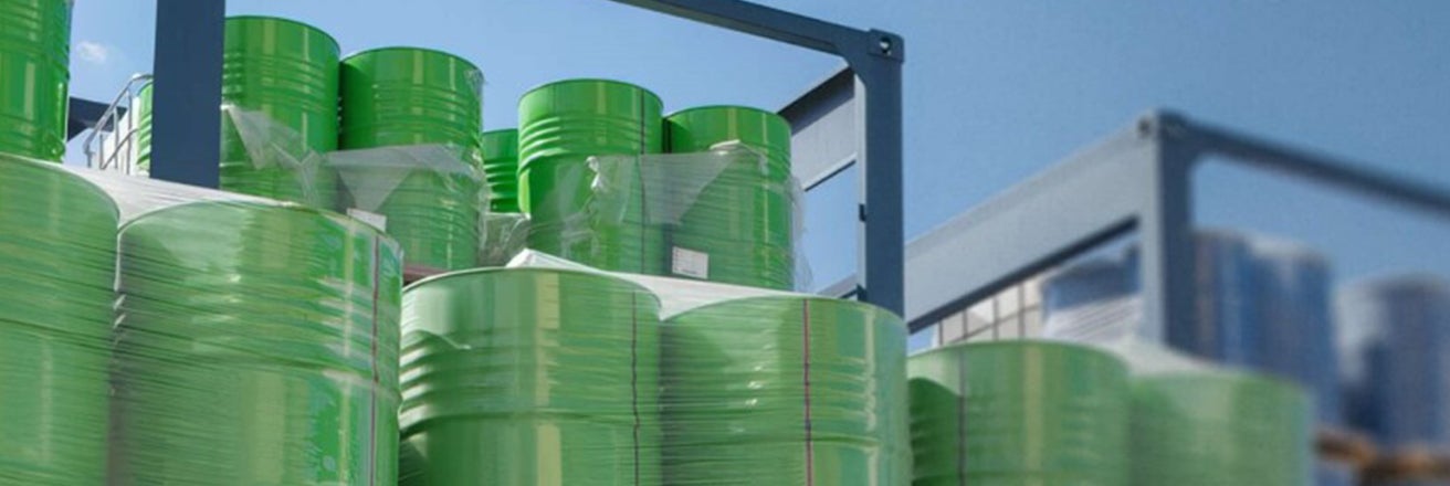Green waste container drums stacked