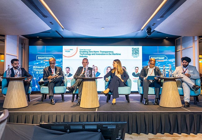 Ariana Psomas, a PPG employee, speaks at the RightShip Forum