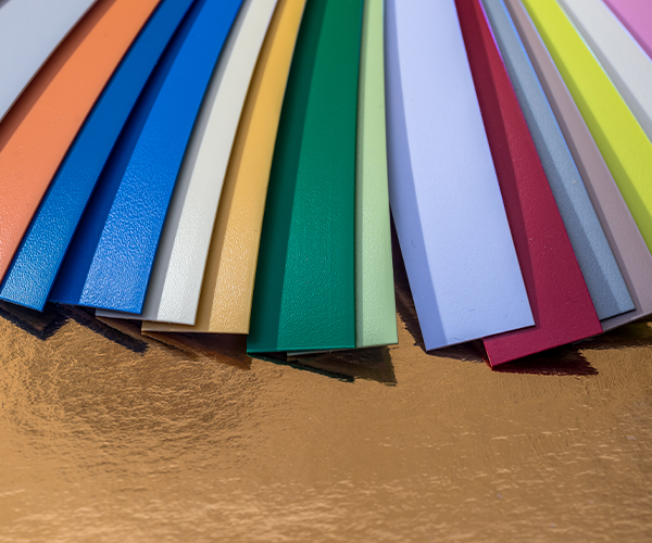 Colorful fan deck of metal panels coated with multiple colors