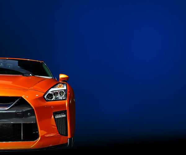 Highly polished orange car coated with PPG paint