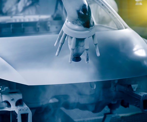 Nozzles on paint sprayer in car production line
