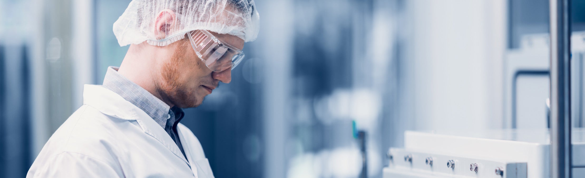 cleanroom lab technician using Teslin substrate