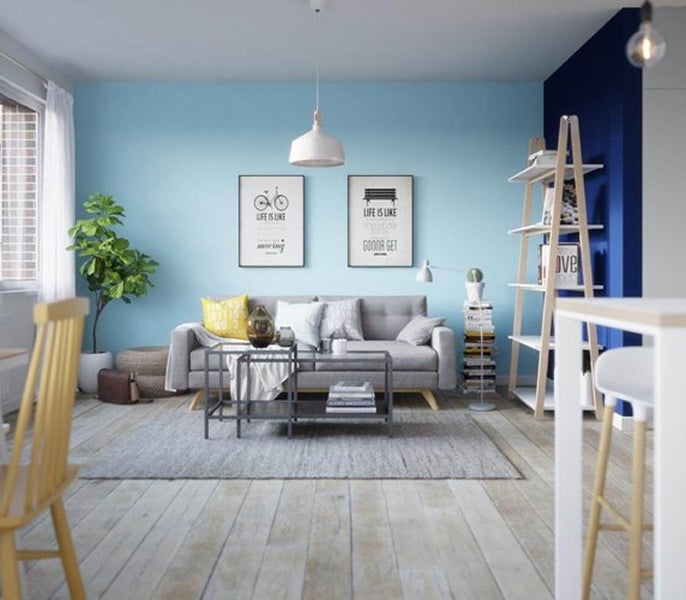 A living room with a couch and a table