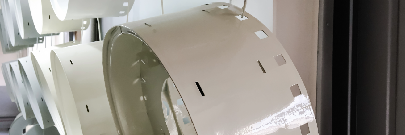 White metal parts going through manufacturing line