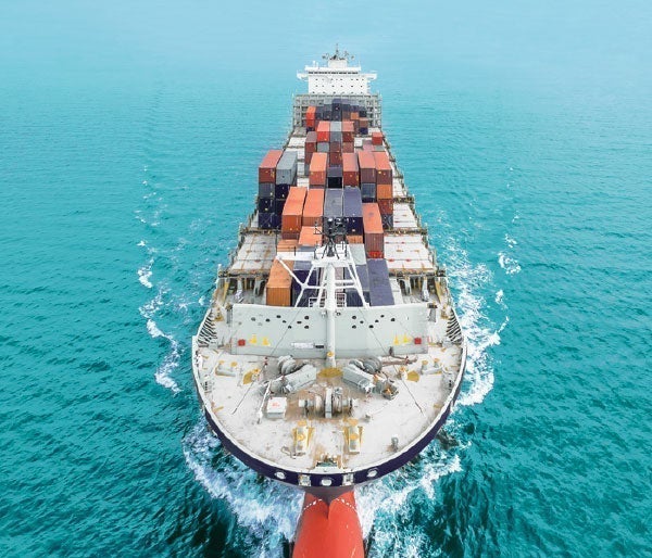 A large ship with containers on it