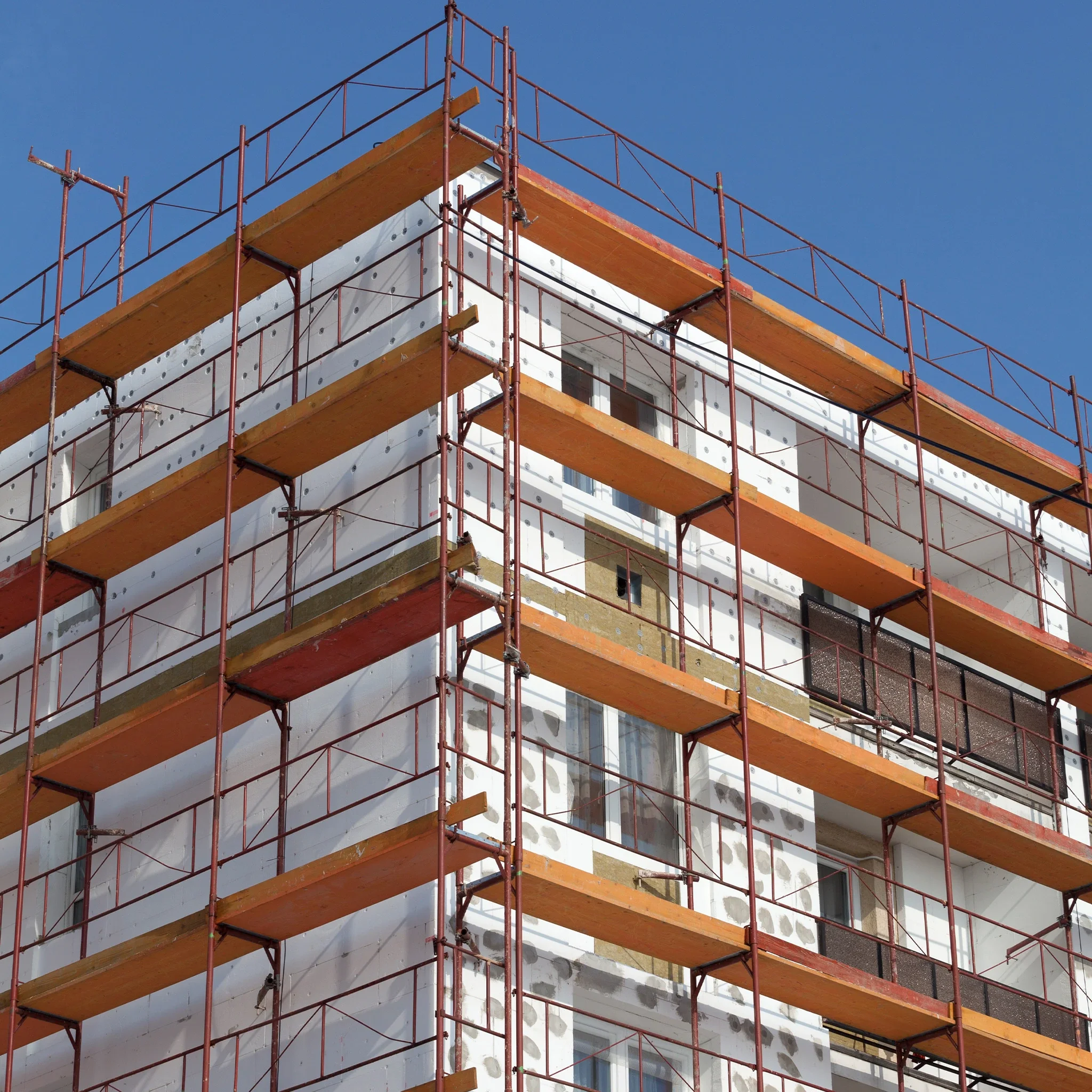 A building under construction with scaffolding