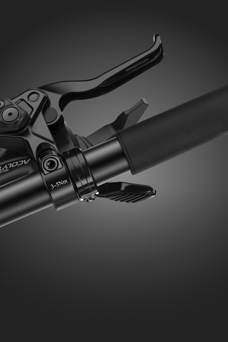 Detailansicht des schwarzen Trigger-Schalthebels am woom EXPLORE e E-Bike.