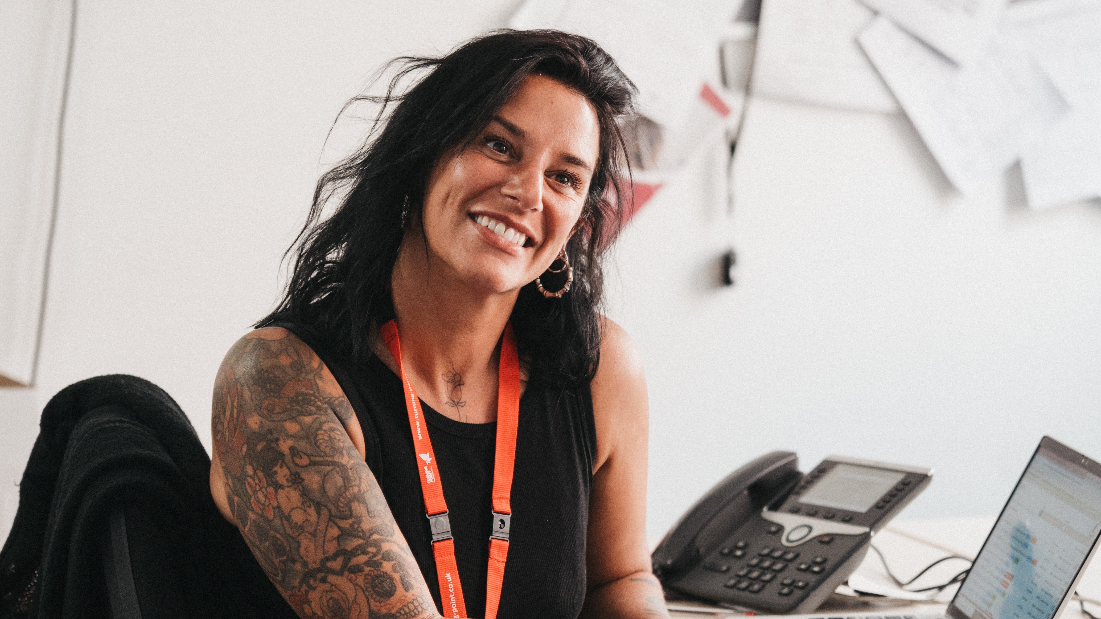 A woman smiling at camera