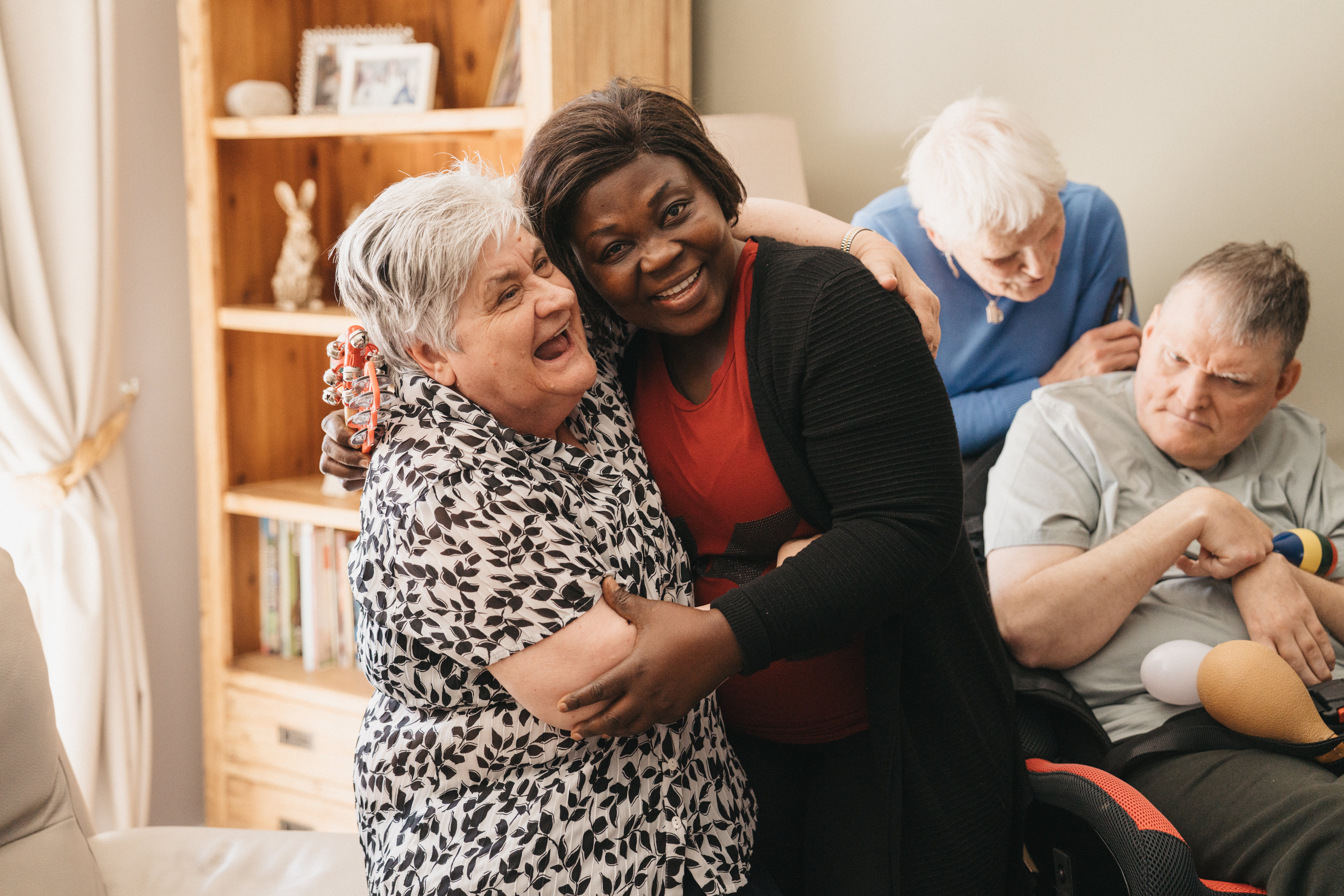 Two people embracing and smiling