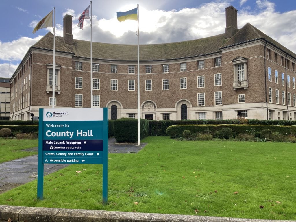 A building with a sign in front of it