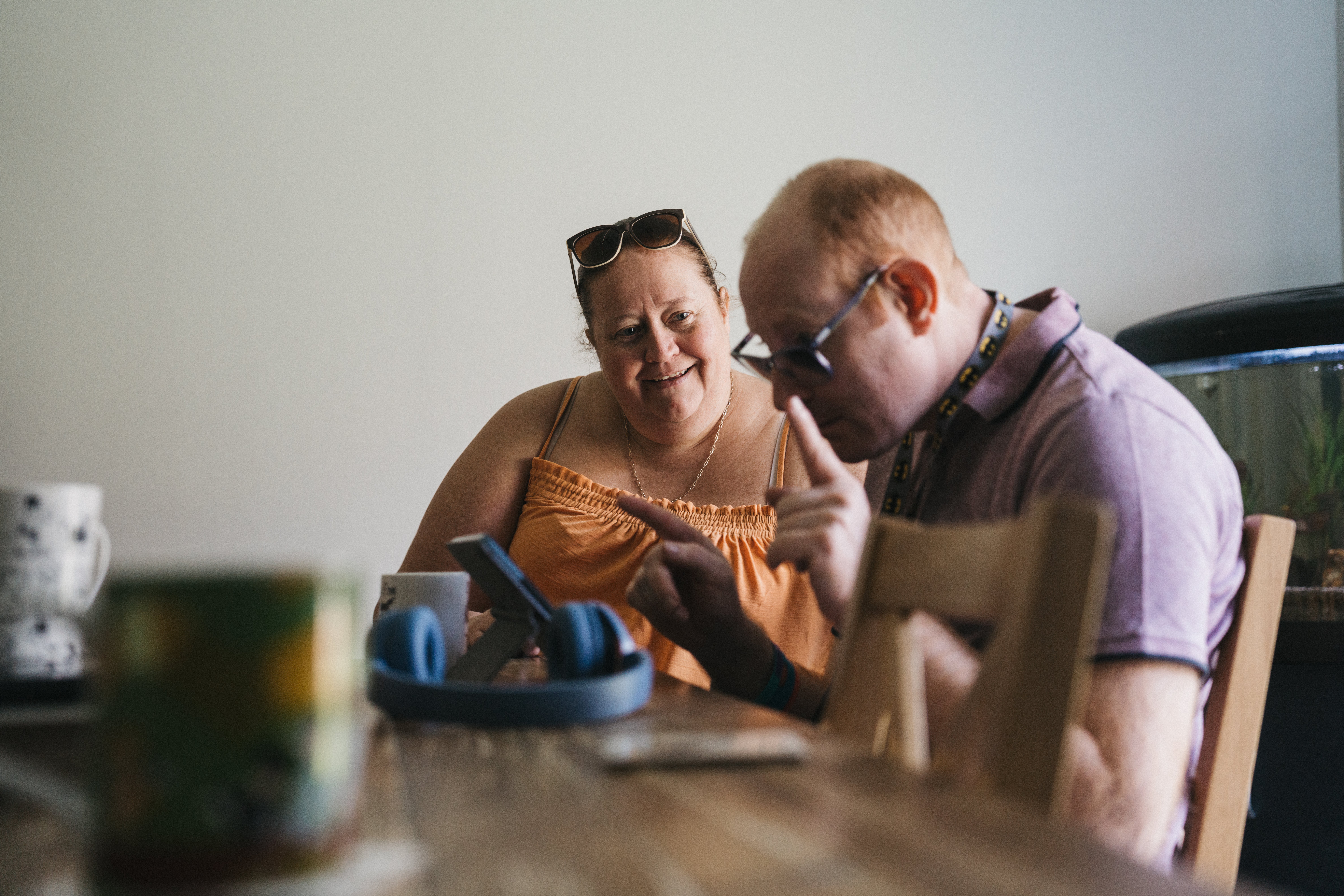 Two people sat at a table