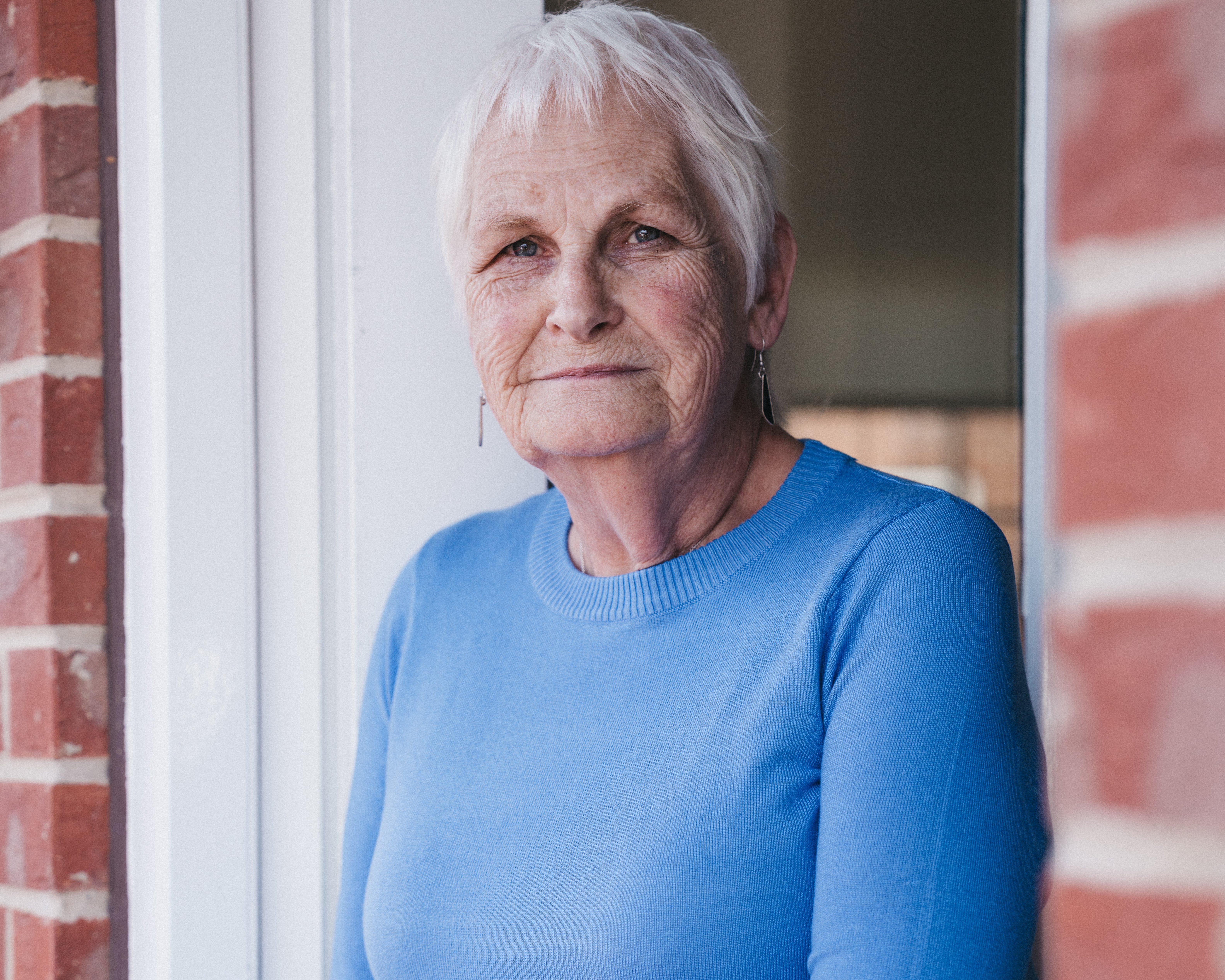 A woman in a blue shirt