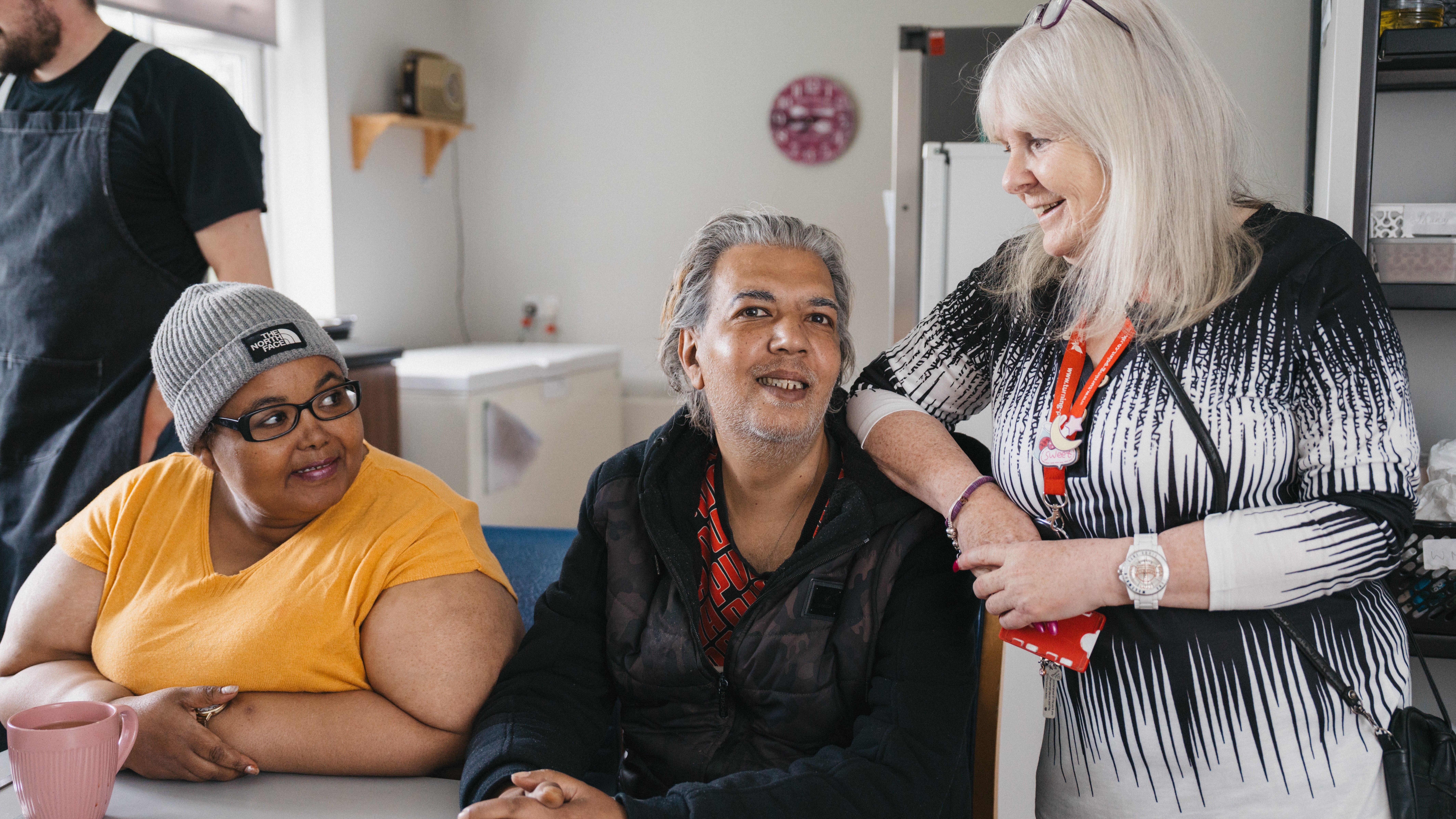A group of people sitting at a table
