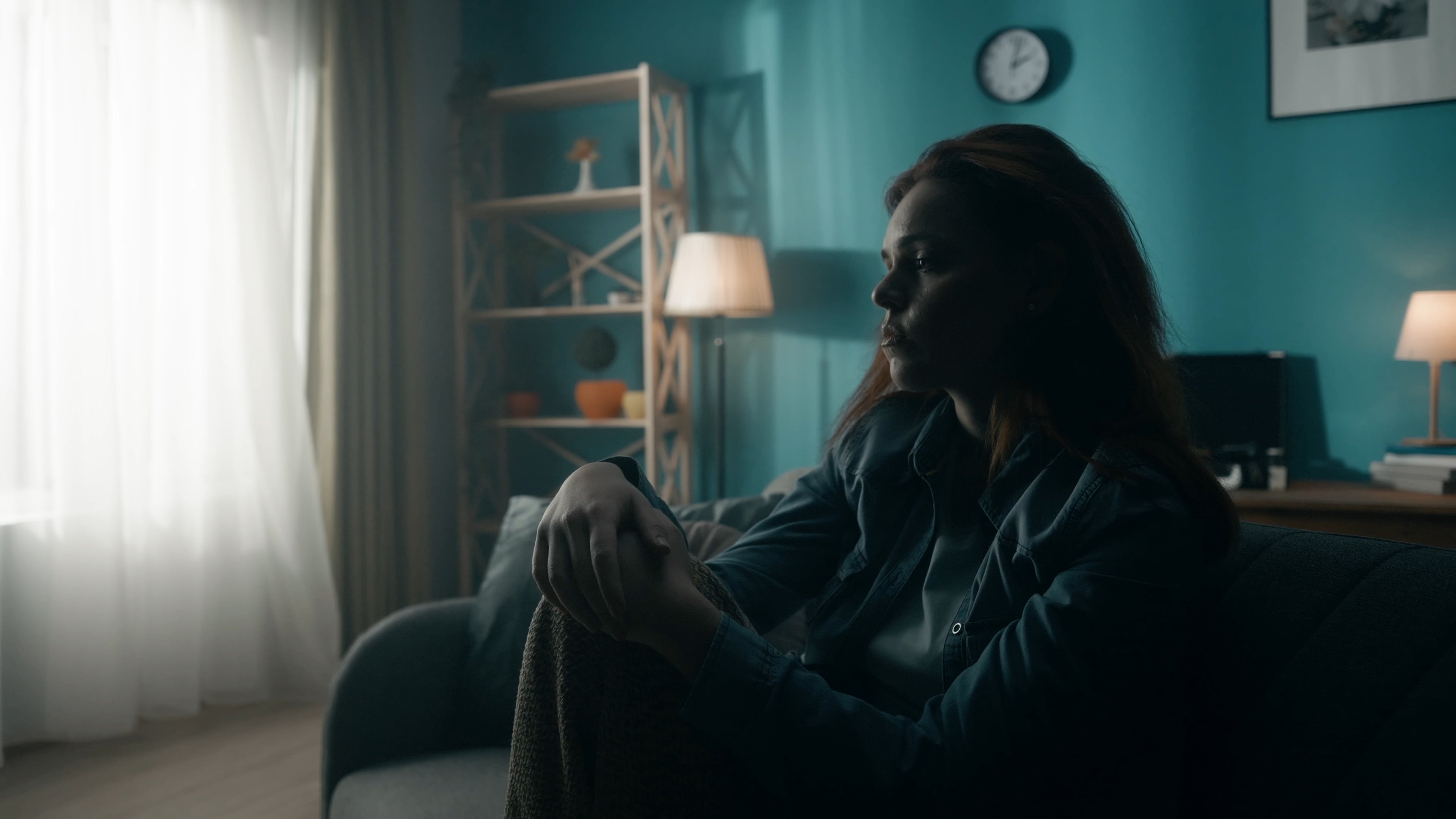 A woman sitting on a couch