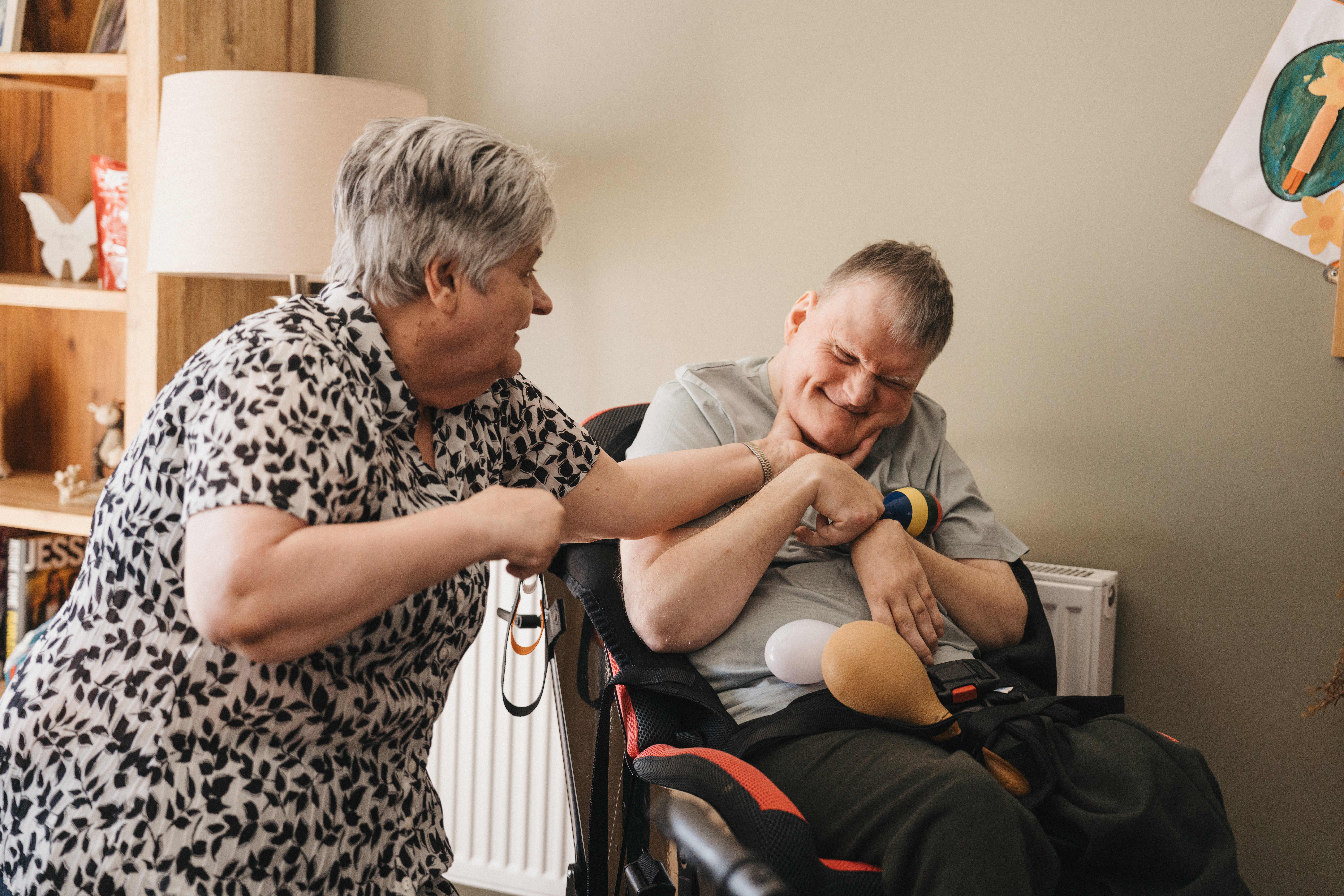 Two people standing next to each other