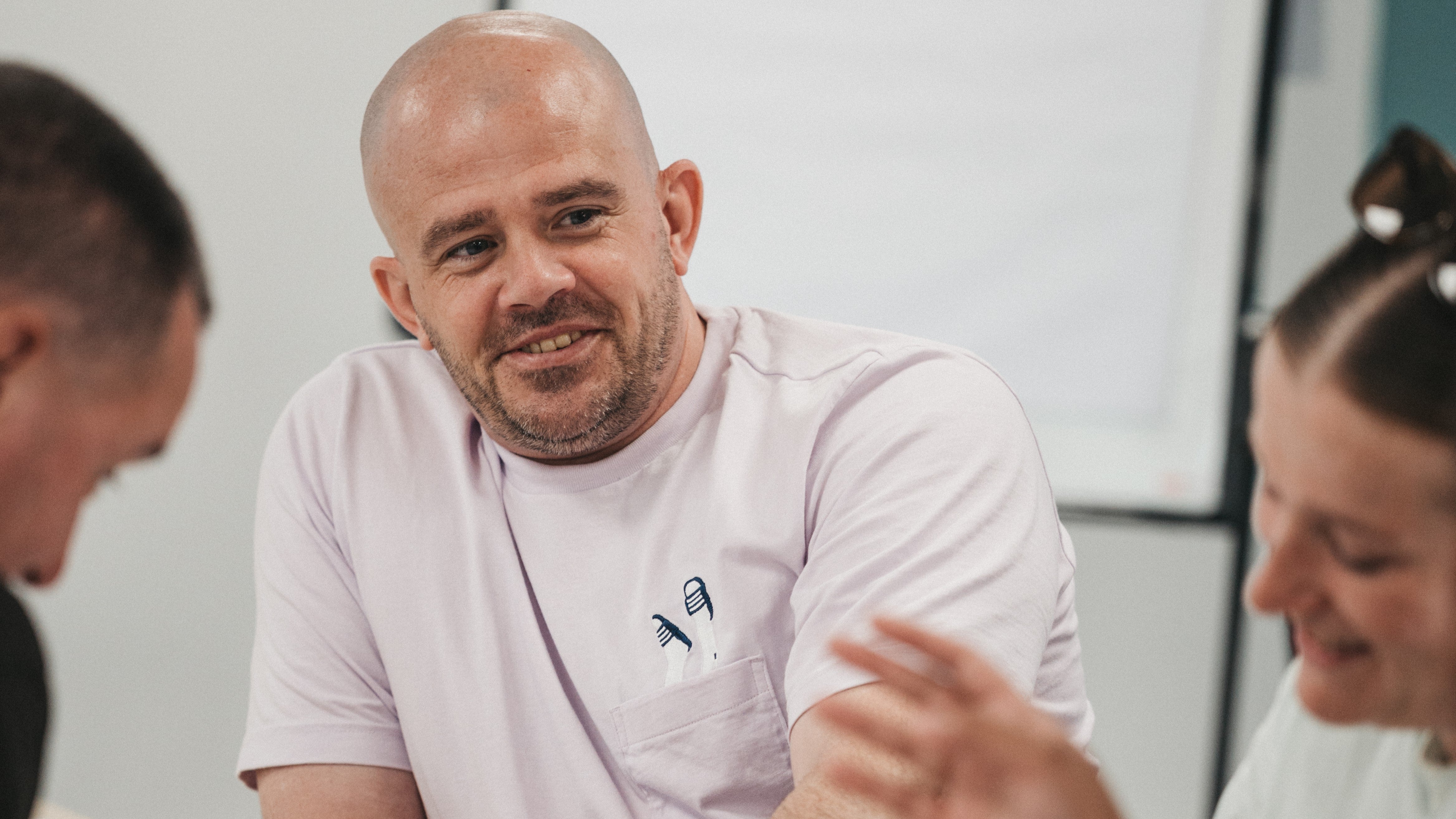 A man in a white shirt