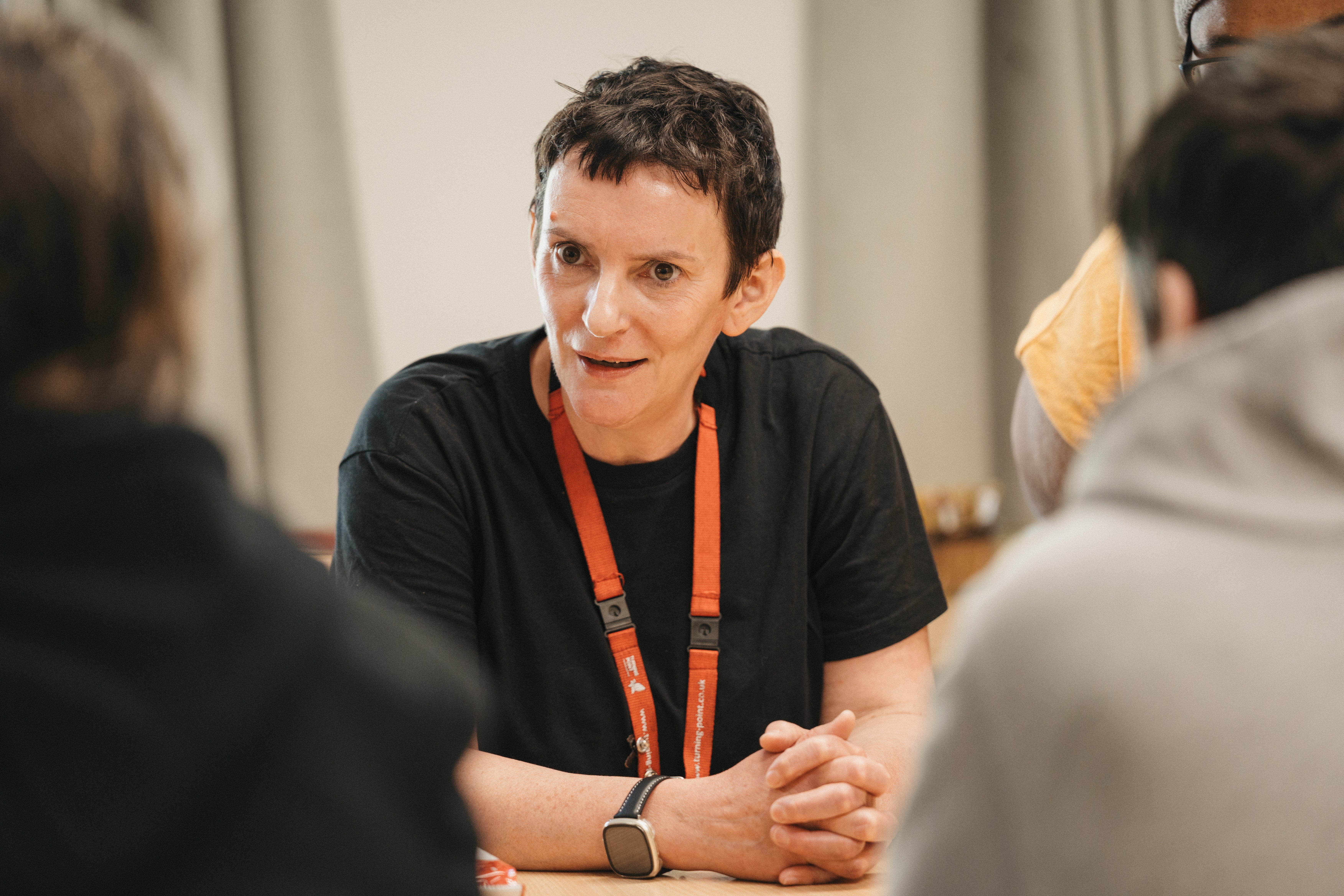 A woman sitting at a table