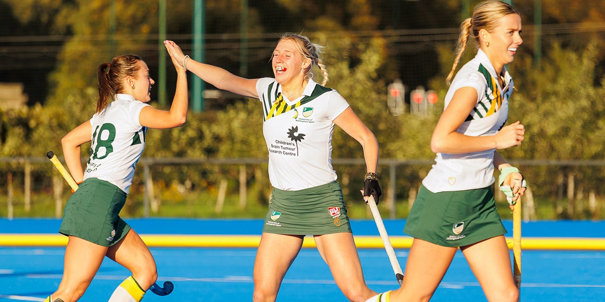 Univeristy of Nottingham hockey players celebrate on the pitch