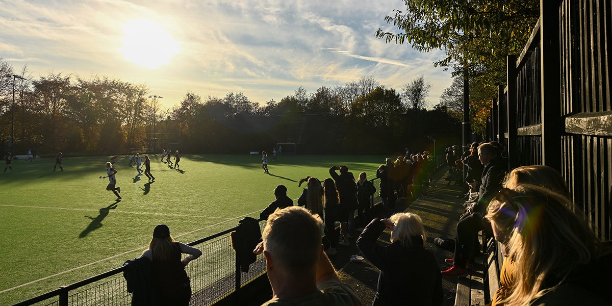A photo of the crowd cheering a hockey match