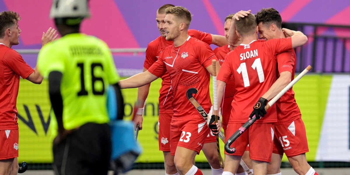 The boys celebrating, looking rather happy 