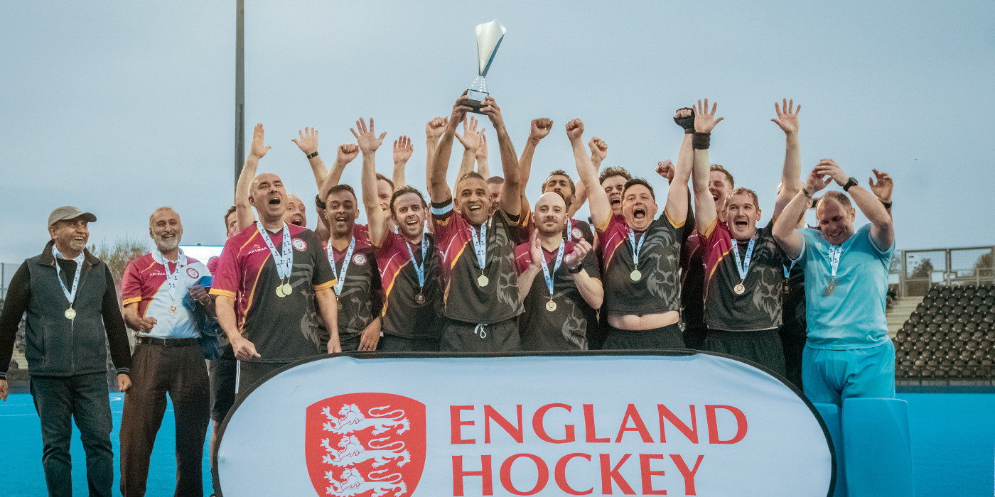 Masters Hockey Team Celebrating Trophy Lift 